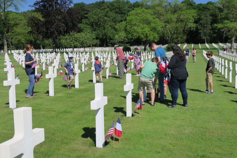 Volunteers helped place American and French flags at every headstone at Lorraine American Cemetery for the 2017 Memorial Day Ceremony.