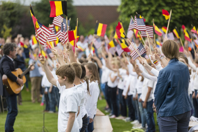 Local students sang the Star-Spangled Banner during 2016 Memorial Day Ceremony at Flanders Field American Cemetery.