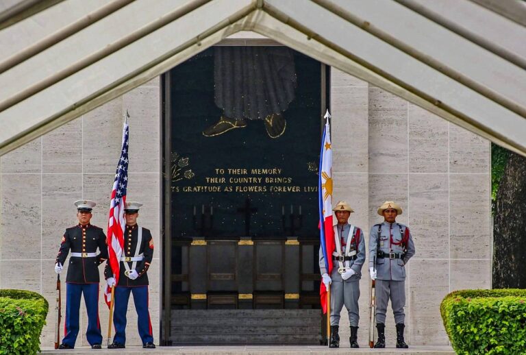 The joint Honor Guard stands outside the chapel at Manila American Cemetery during the 2016 Memorial Day Ceremony.