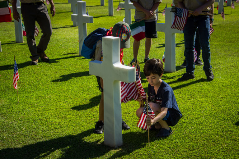 Boy Scouts helped place flags in front of every headstone at Sicily-Rome American Cemetery in preparation for the 2017 Memorial Day Ceremony.