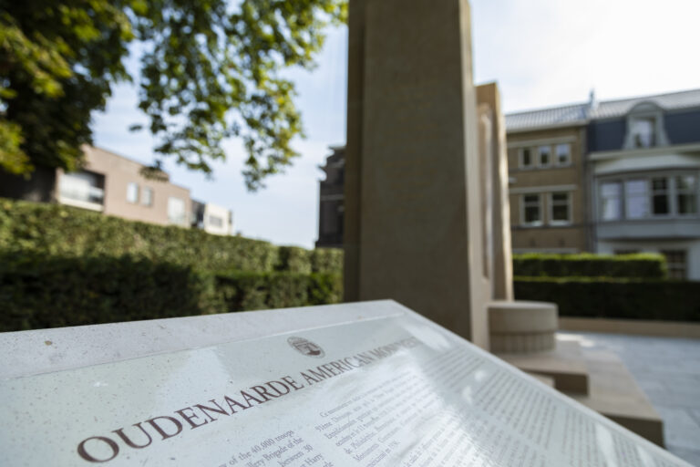 A panel near the monument explains the relevance of the Audenarde Monument. Photo Credit: Mike Shipman/American Battle Monuments Commission.