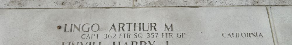 A bronze rosette next to the name of Arthur Lingo on the Wall of the Missing signifies he has been identified.