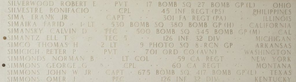 A rosette next to the name of Tech 5 Ell T. Simantz on the Walls of the Missing at Manila American Cemetery signifies he has been identified. (Photo: American Battle Monuments Commission)