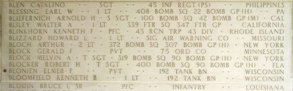 A rosette next to the name of Pvt. Elmer F. Blonien on the Walls of the Missing at Manila American Cemetery signifies he has been identified. (ABMC photo)