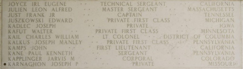 A rosette next to the name of Pvt. Joseph P. Karnaghon on the Walls of the Missing at Manila American Cemetery signifies he has been identified. (ABMC photo)