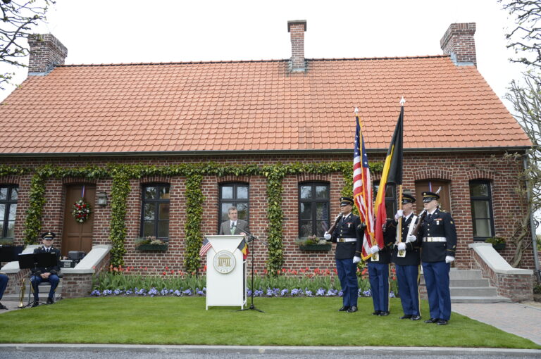 Chargé d’Affaires Matthew Lussenhop delivered remarks during the ceremony to dedicate the renovated visitor center at Flanders Field American Cemetery.  Image courtesy of the U.S. Embassy in Belgium.