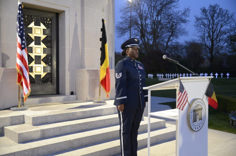 A member of the U.S. Air Force sings the national anthem as part of the centenary event at Flanders Field American Cemetery on April 6