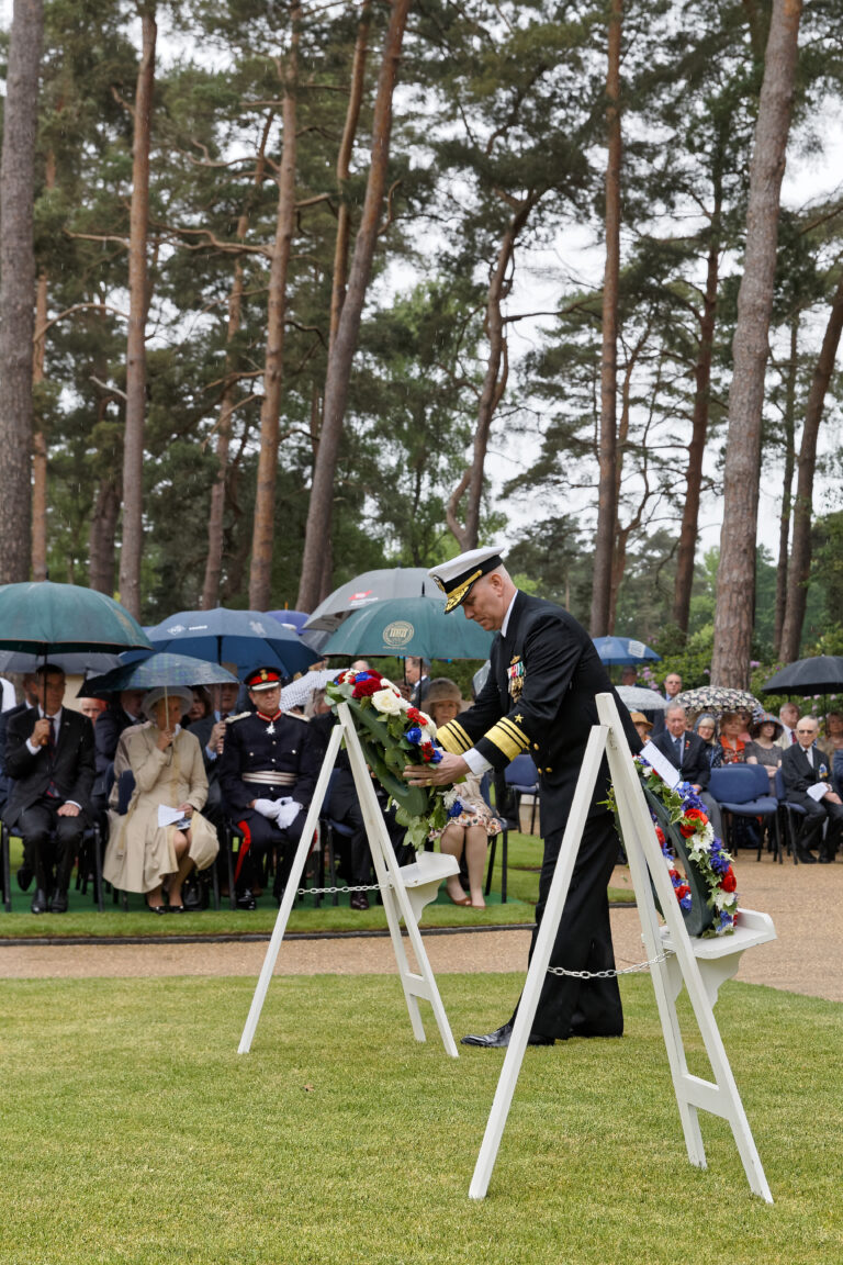 A member of the military lays a wreath during the 2017 Memorial Day Ceremony at Brookwood American Cemetery. Image courtesy of Anthony McCallum.