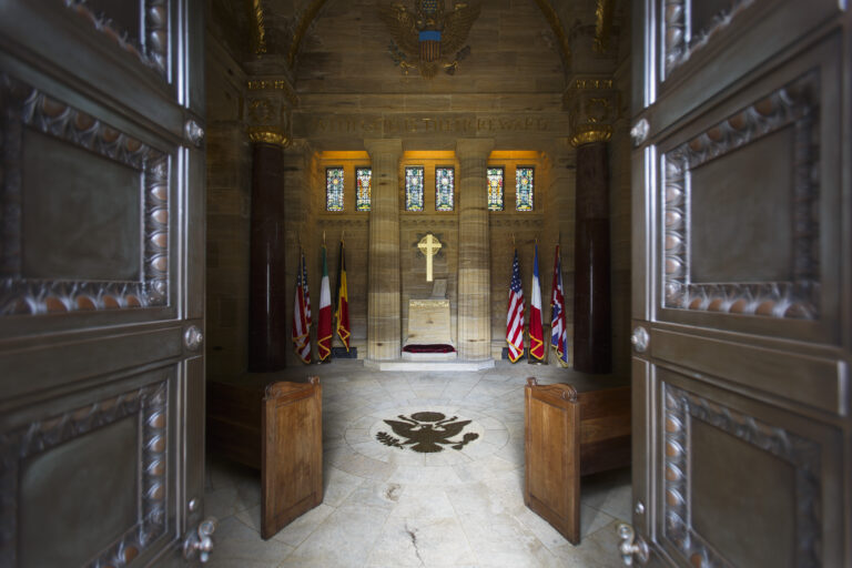 The entrance to the chapel at Brookwood American Cemetery is marked by bronze doors. Photo Credit: Warrick Page/American Battle Monuments Commission.