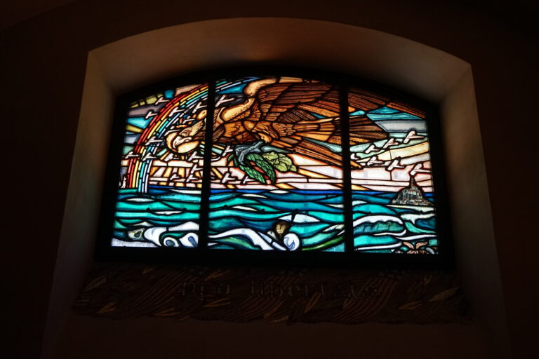 Intricate stained-glass windows can be seen from the crypt of the Lafayette Escadrille Memorial Cemetery.