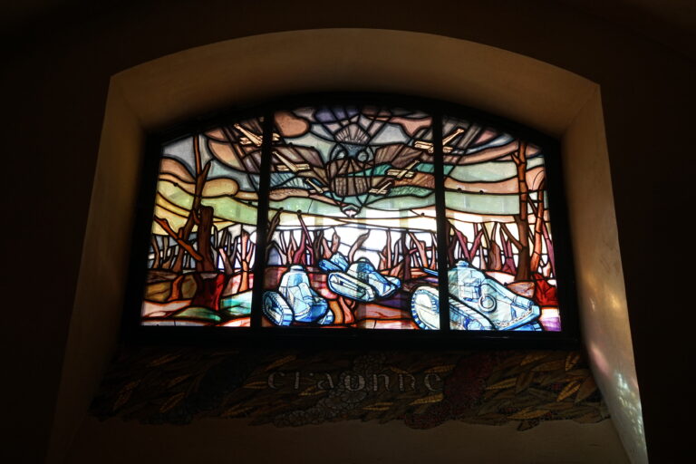 Intricate stained-glass windows can been seen from inside the crypt at the Lafayette Escadrille Memorial Cemetery.