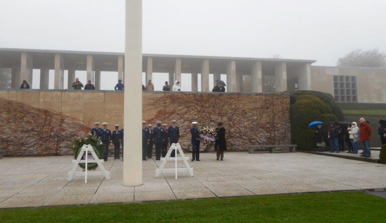 A member of the Coast Guard and Superintendent Bobby Bell lay a wreath during the 2016 Veterans Day Ceremony at Henri-Chapelle American Cemetery.