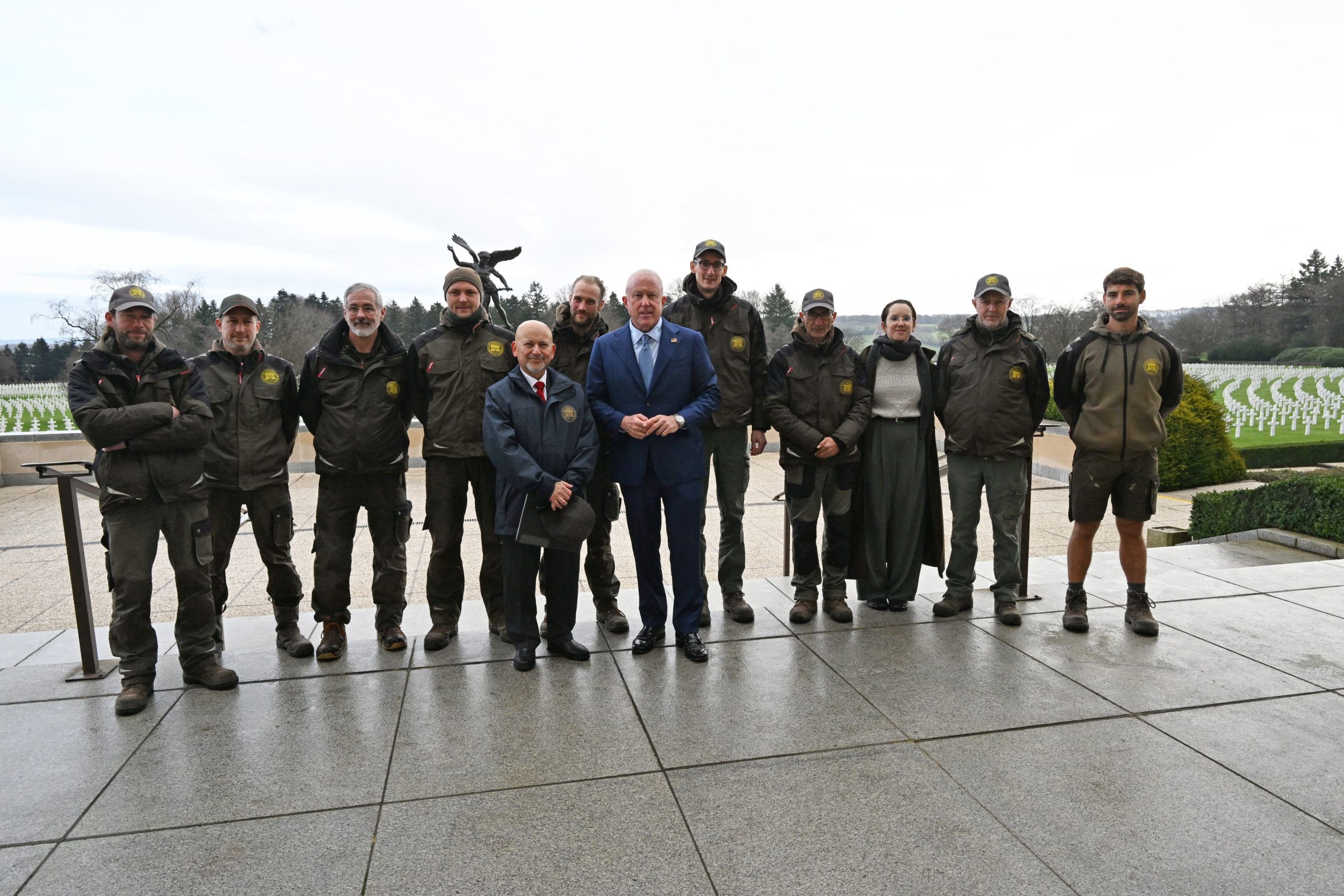 U.S. Ambassador to the Kingdom of Belgium, Bill White, at Henri-Chapelle American Cemetery with Superintendent Carlos Gavilanes and his team. Credit: Courtesy of U.S. Embassy to the Kingdom of Belgium. 