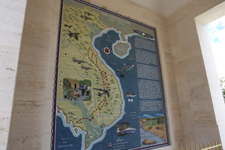 A concrete mosaic battle map at the Honolulu Memorial shows the Vietnam War.