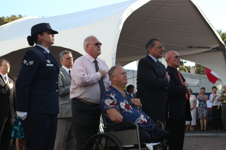 Secretary of Defense Leon Panetta prepares to lay a wreath at the Honolulu Memorial.