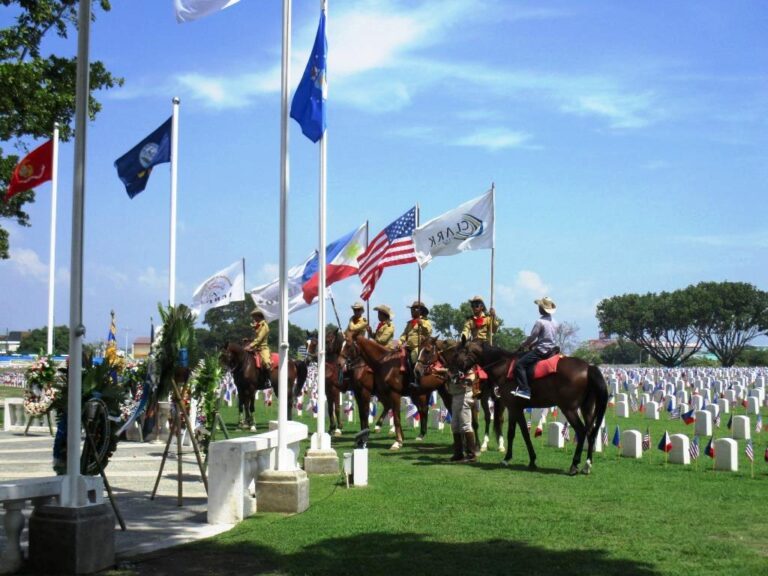 Men an horses participate in the 2016 Memorial Day Ceremony at Clark Veterans Cemetery.