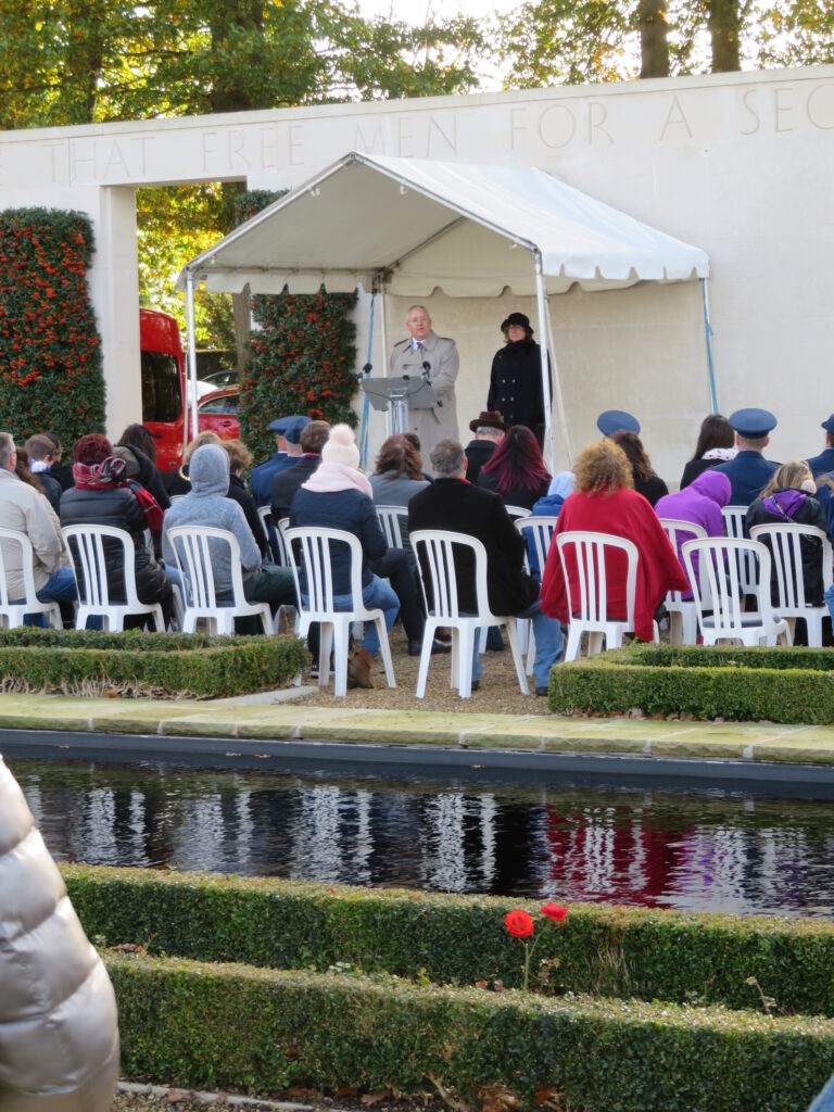 ABMC staff member Jerry Lefler delivers opening remarks during the 2017 Veterans Day Ceremony at Cambridge American Cemetery.