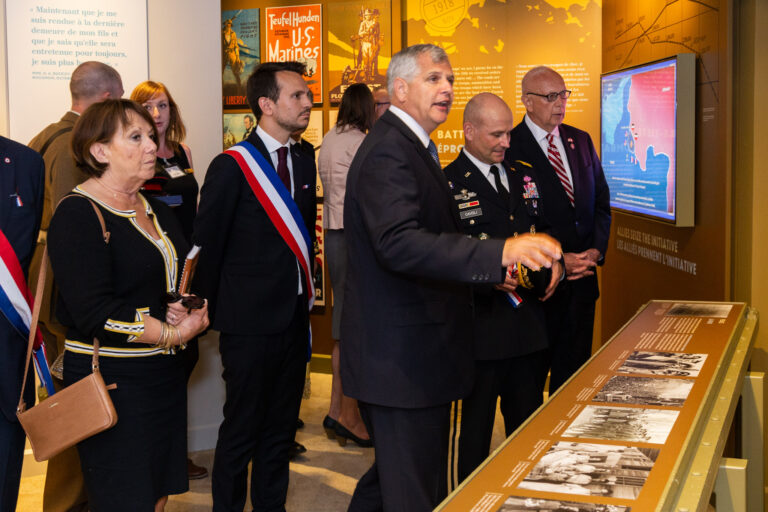 Deputy Secretary Robert Dalessandro talks about the exhibits inside the new visitor center at Chateau-Thierry American Monument after the dedication ceremony.Photo credit: Julien Nguyen-Kim/American Battle Monuments Commission.