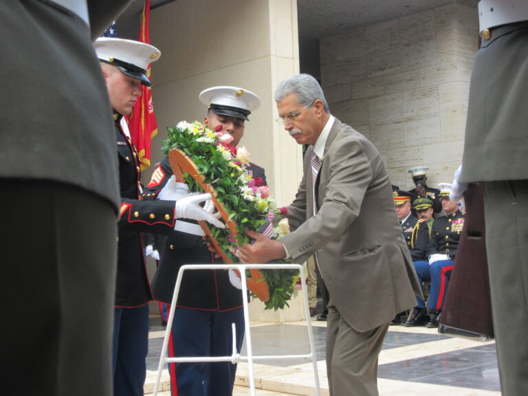 Superintendent Foued Bouaziz lays a wreath during the 2016 Veterans Day Ceremony at North Africa American Cemetery.