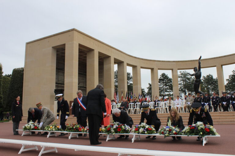 Members of the official party lay floral wreaths during the 2016 Memorial Day Ceremony at Normandy American Cemetery.