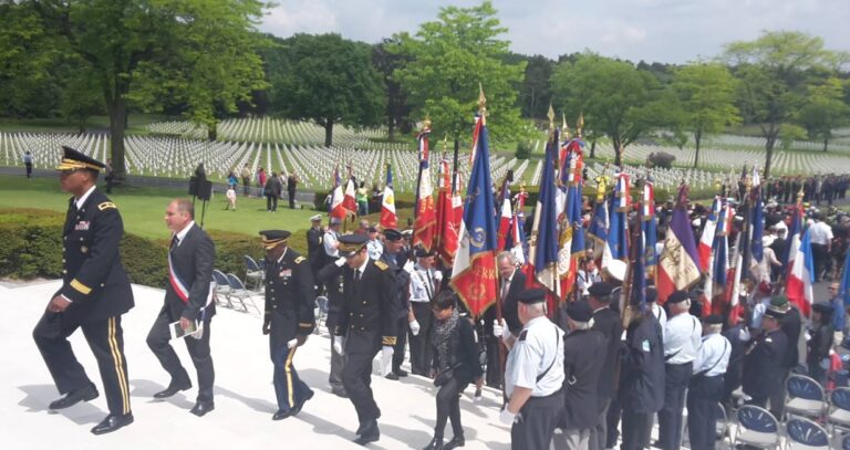 Members of the official party depart during the 2015 Memorial Day Ceremony at Lorraine American Cemetery.