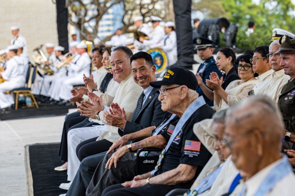 The official party claps for the WWII veterans in attendance Feb. 22 at the commemoration of the 80th anniversary of the liberation of Manila.