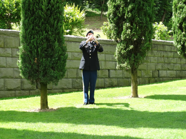 A member of the U.S. Army plays "Taps" during the 2016 Memorial Day Ceremony at Florence American Cemetery.