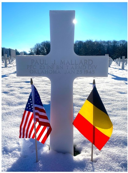 Picture of the headstone of Pfc. Paul J. Mallard at Ardennes American Cemetery under the snow. Credit: American Battle Monuments Commission.