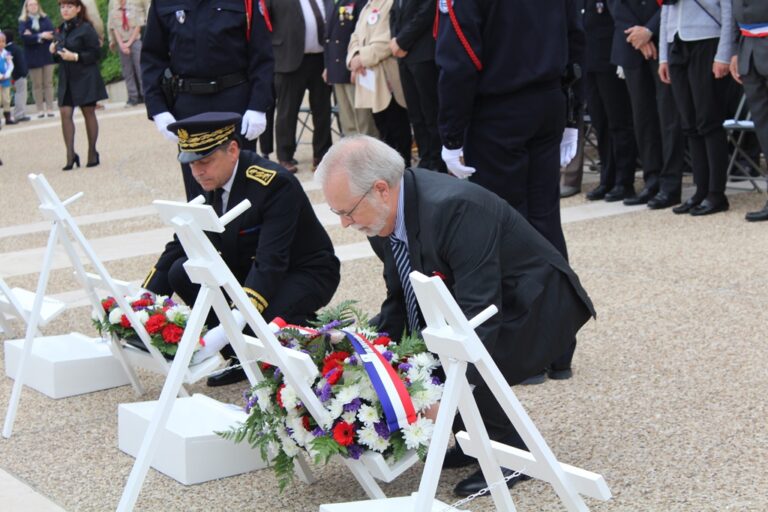 U.S. Consul General Daniel Goodspeed along with Prefect Yann Jounot lay floral wreaths during the 2016 Memorial Day Ceremony at Suresnes American Cemetery. Image courtesy of Emily Munsel.