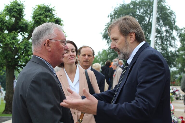 Superintendent Angelo Munsel thanks the YMCA representative after the 2016 Memorial Day Ceremony at Suresnes American Cemetery. Image courtesy of Emily Munsel.