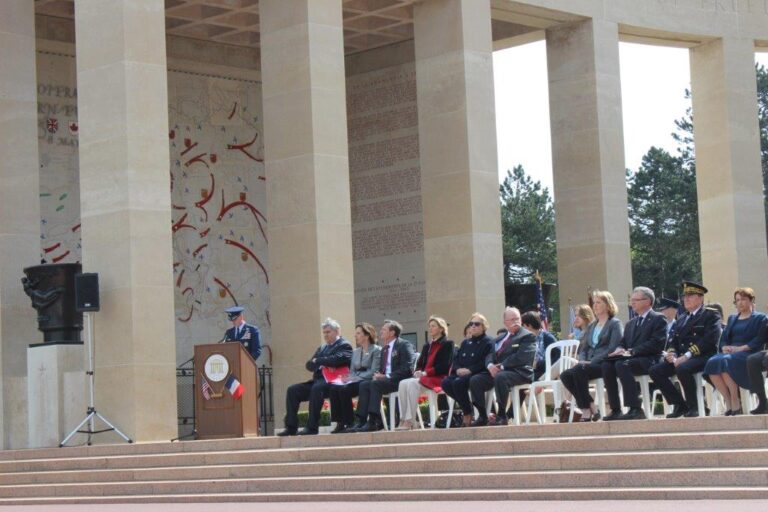 A U.S. military official delivers remarks during the 2015 Memorial Day Ceremony at Normandy American Cemetery.