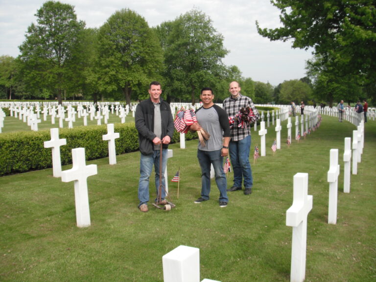 Volunteers from RAF Alconbury helped to place the American and British flag at the base of every headstone at Cambridge American Cemetery in preparation for the 2016 Memorial Day Ceremony.