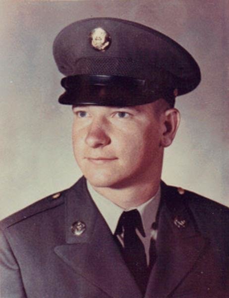 Studio portrait of a Sergeant First Class Donald “Don” Lee Sparks, in military dress uniform and cap