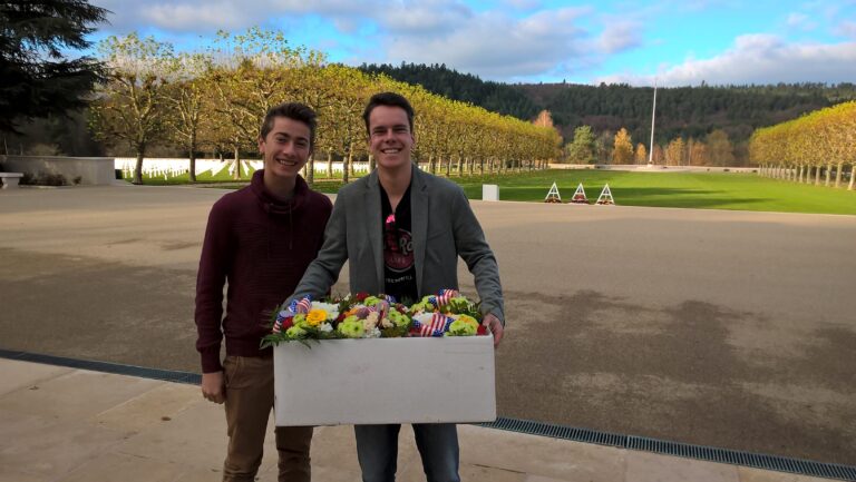 Local citizens came to Epinal American Cemetery on November 11 to bring flowers to their adopted grave sites. These adopters do not clean the headstones