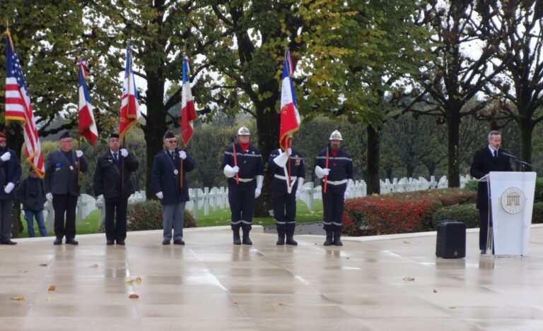 ABMC staff member Jeffrey Aarnio reads the Presidential Proclamation in French during the 2016 Veterans Day Ceremony at Meuse-Argonne American Cemetery.