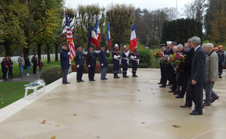 Members of the official party prepare to lay wreaths during the 2016 Veterans Day Ceremony at Meuse-Argonne American Cemetery.